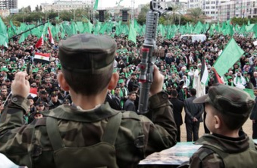 Palestinian children celebrate Hamas founding 370 (photo credit: REUTERS/Ahmed Jadallah)