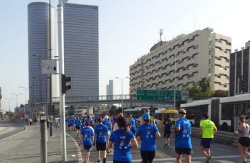 Runners take part in Tel Aviv marathon 370 (photo credit: Tamara Zieve)