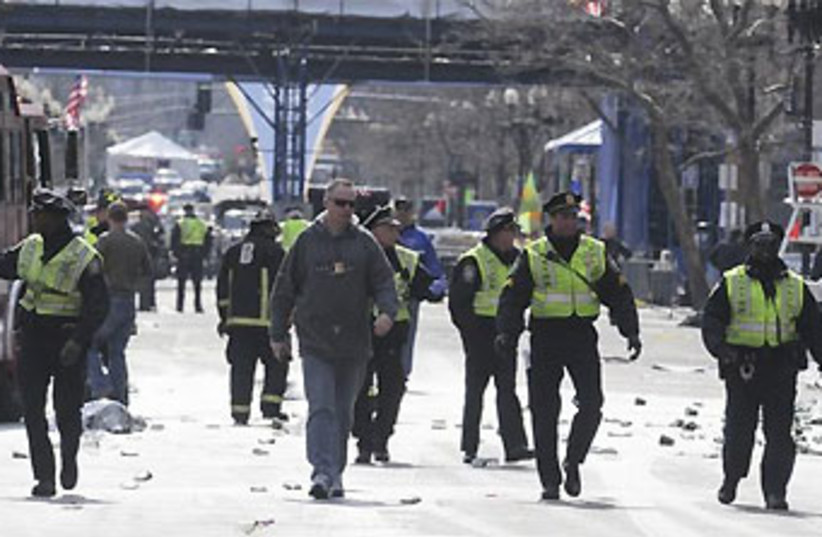 Boston blasts evacuation 370 (photo credit: Reuters)
