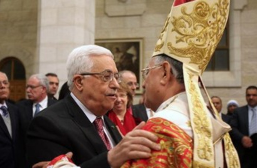 Abbas greets Latin Patriarch of Jerusalem Fouad Twal 370 (photo credit: REUTERS)