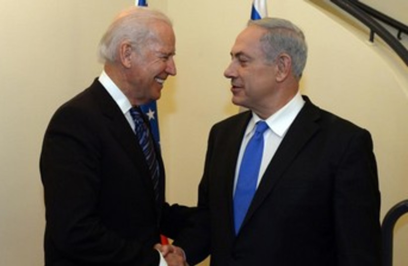 US Vice President Joseph Biden and Prime Minister Binyamin Netanyahu. (photo credit: GPO/Haim Zach)
