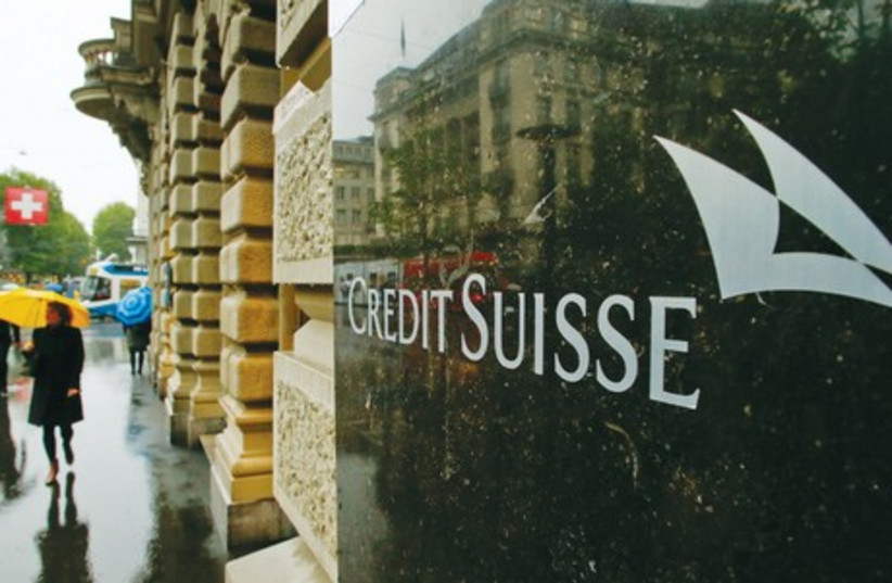 UNITED STATES prosecutors have been pushing for Credit Suisse, the biggest Swiss bank, in a tax-evasion probe into Swiss banks by US authorities, to plead guilty as part of a resolution of the investigation (photo credit: REUTERS)