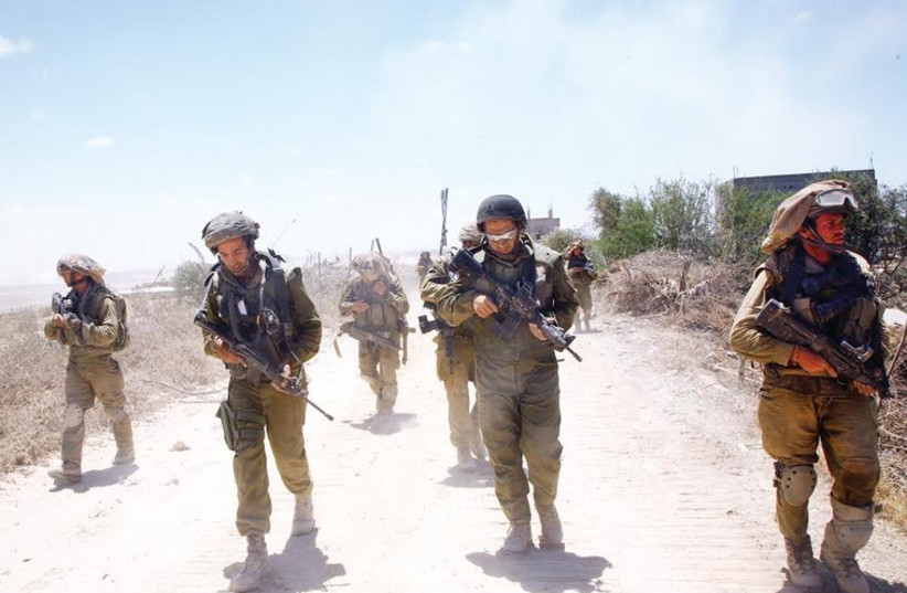 IDF soldiers take part in Operation Protective Edge. (photo credit: ANNA GOLIKOV)
