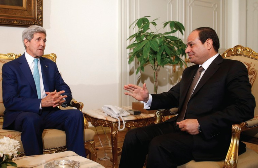 US Secretary of State John Kerry (left) meets with Egyptian President Abdel Fatah al-Sisi in Cairo. (photo credit: REUTERS)