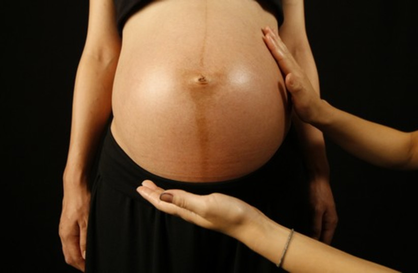 A pregnant woman (photo credit: REUTERS)