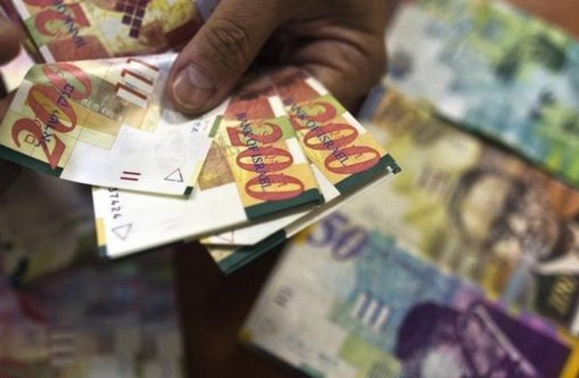 Shekel money bills (photo credit: REUTERS)
