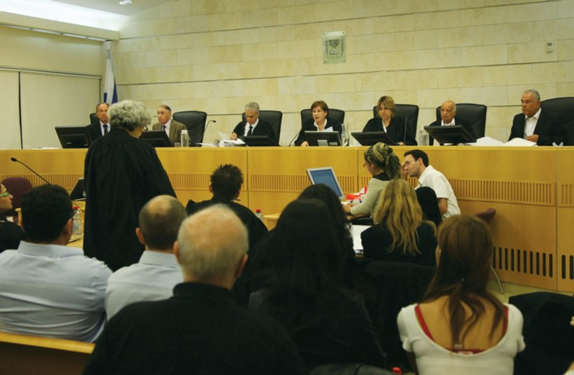 Judges preside in court (Illustrative) (photo credit: ILLUSTRATIVE: MARC ISRAEL SELLEM)