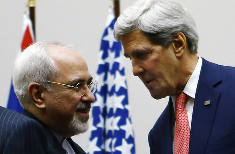 Iranian Foreign Minister Mohammad Javad Zarif (L) and US Secretary of State John Kerry (photo credit: REUTERS)