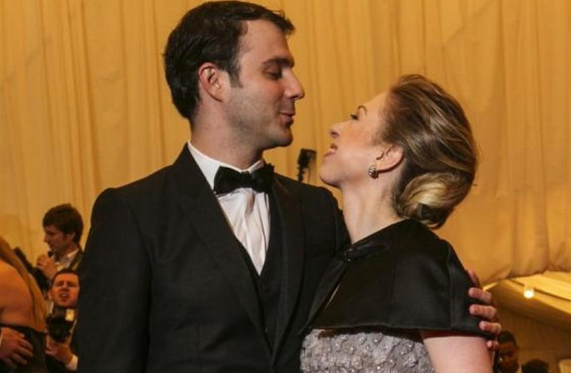 Chelsea Clinton and husband Marc Mezvinsky in 2013 (photo credit: REUTERS)