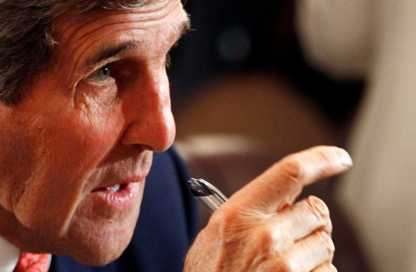 US Secretary of State John Kerry in Cairo at the Gaza donors conference (photo credit: REUTERS)
