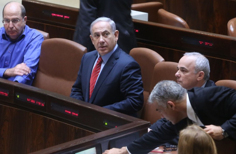 Netanyahu in the Knesset with Ya'alon, Lapid and others, December 3, 2014 (photo credit: MARC ISRAEL SELLEM)