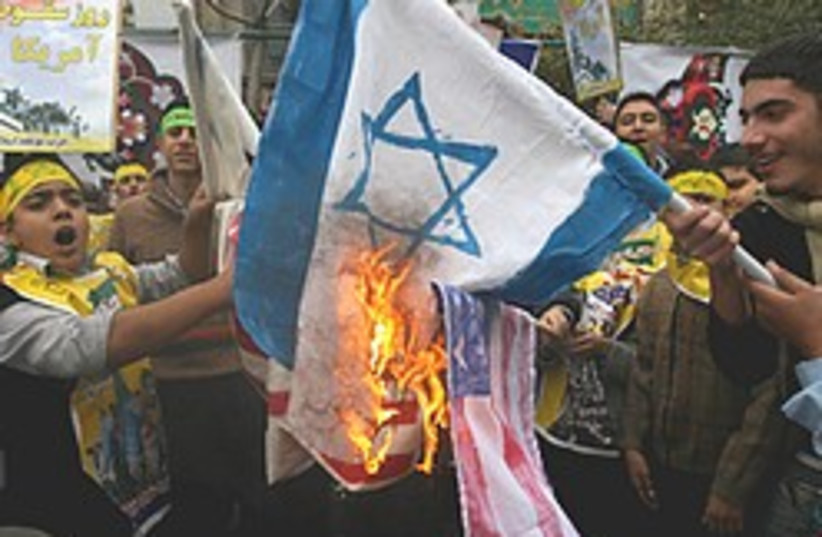 iran flag burning 248.88 (photo credit: AP)