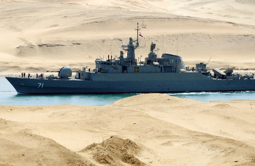 An Iranian naval ship travels through the Suez Canal (photo credit: REUTERS)