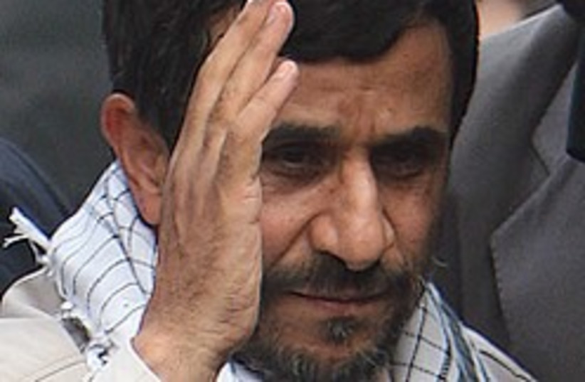 ahmadinejad salutes 248.88 (photo credit: AP)