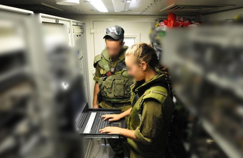 Soldiers from the IDF C4i Branch operating equipment (photo credit: IDF SPOKESMAN’S UNIT)