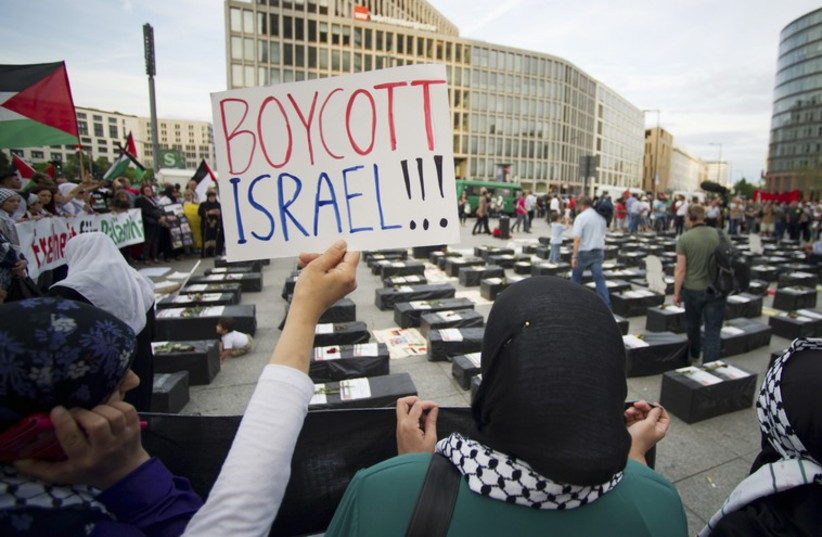 Protesters call for boycott of Israel [file] (photo credit: REUTERS)