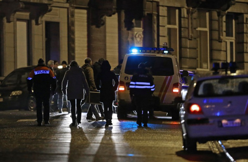 Belgian police walk in central Verviers, a town in the east of Belgium January 15 (photo credit: REUTERS)