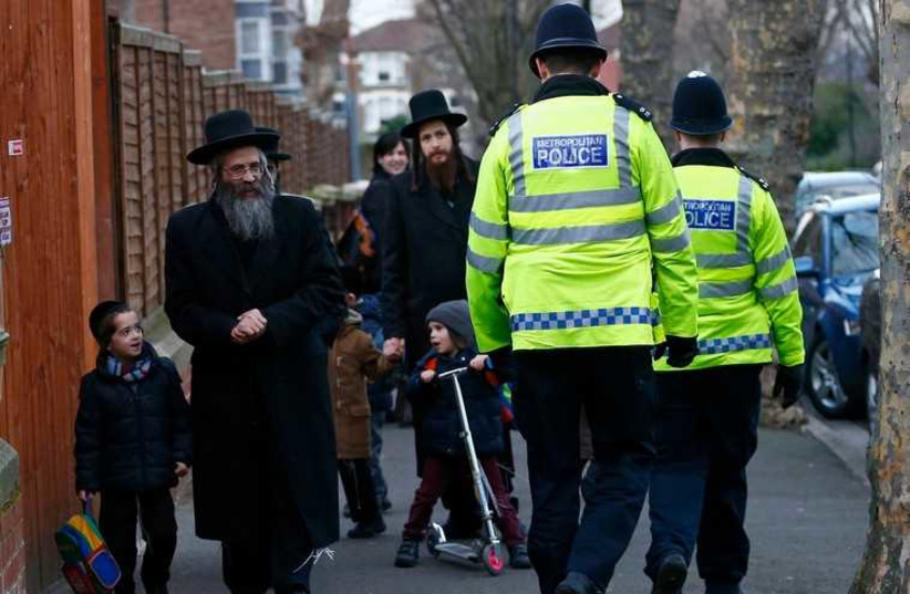 Members of the Jewish community in north London  (photo credit: REUTERS)