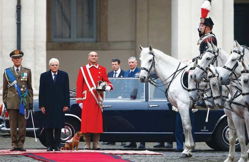ITALY’S NEW President Sergio Mattarella arrives to inspect a guard of honor at the Quirinale Palace in Rome, February 3, 2015 (photo credit: REUTERS)