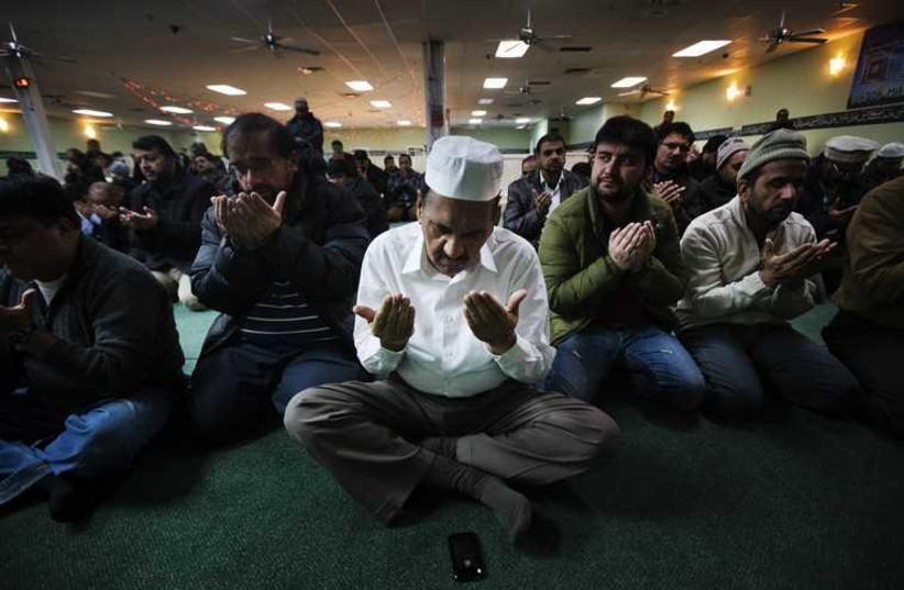 Canadian Muslims during prayer (photo credit: REUTERS)