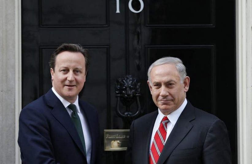 British Prime Minister David Cameron (L) greets Prime Minister Benjamin Netanyahu at 10 Downing Street in London (photo credit: REUTERS)