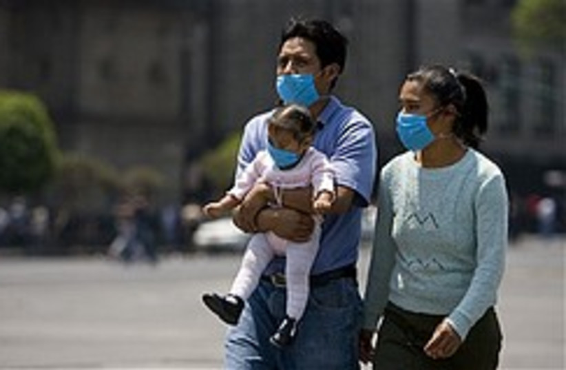 flu masked family 248.88 (photo credit: )