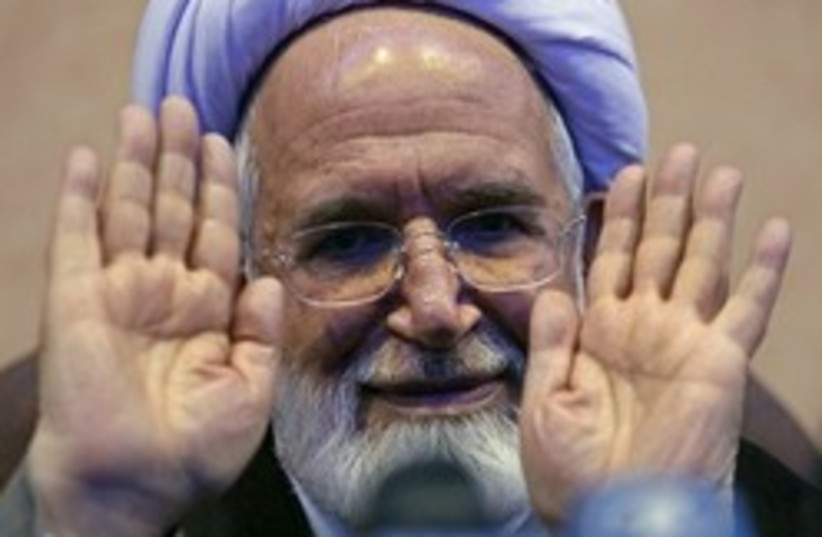 Karroubi purple towel clean hands 248 88 (photo credit: AP)