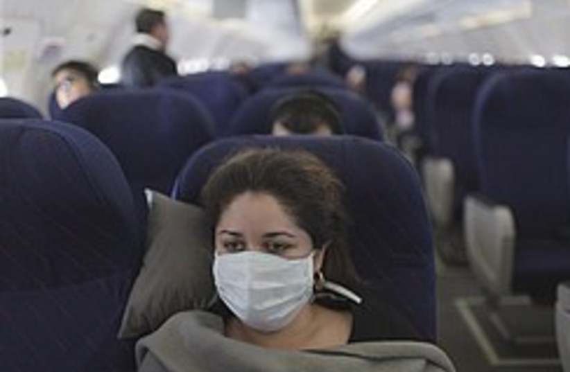swine flu plane 248.88 (photo credit: AP)
