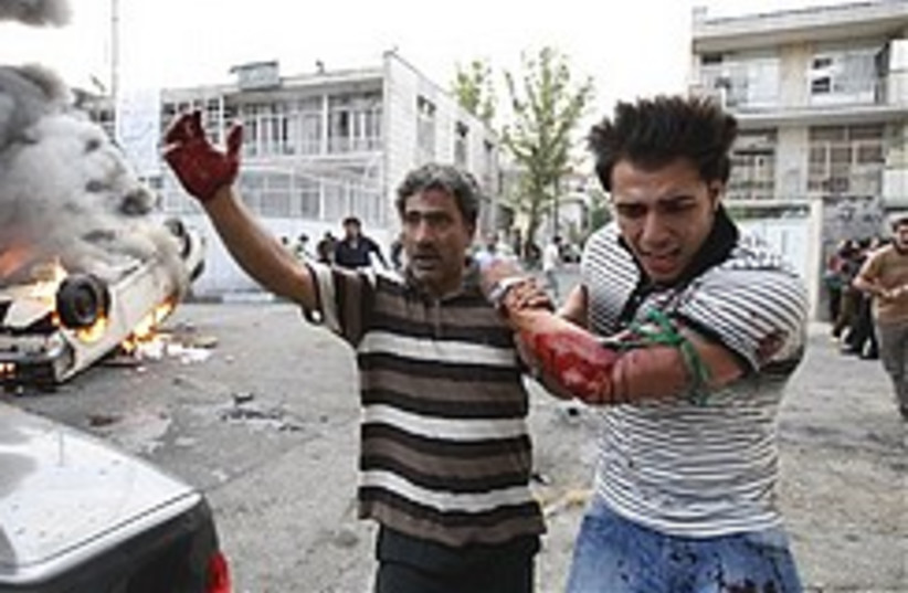 wounded protester Iran 248.88 (photo credit: AP)