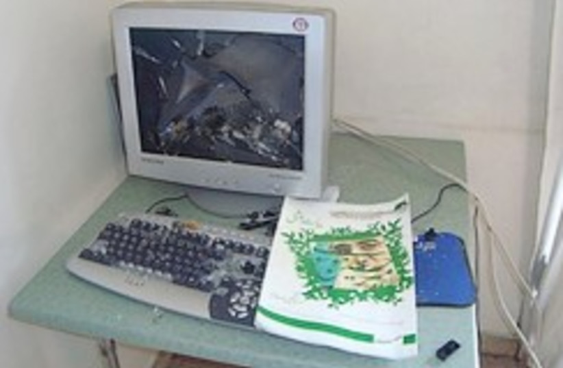 smashed computer Iran 248.88 (photo credit: Courtesy )