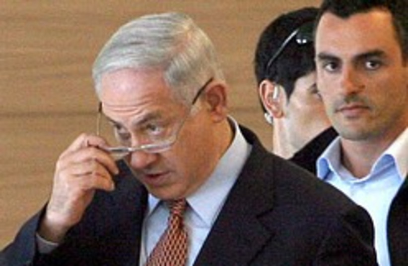 Netanyahu at Knesset four-eyes 248.88 (photo credit: Ariel Jerozolimksi )