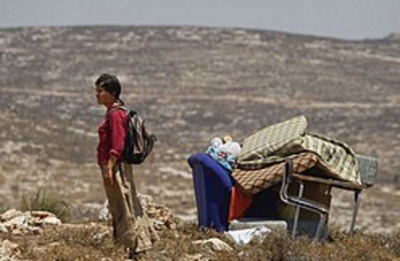 settler demolished outpost 248.88 (photo credit: AP)
