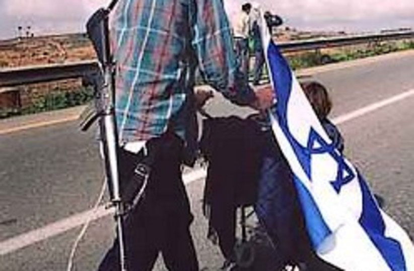 settler marches 248.88 (photo credit: AP)