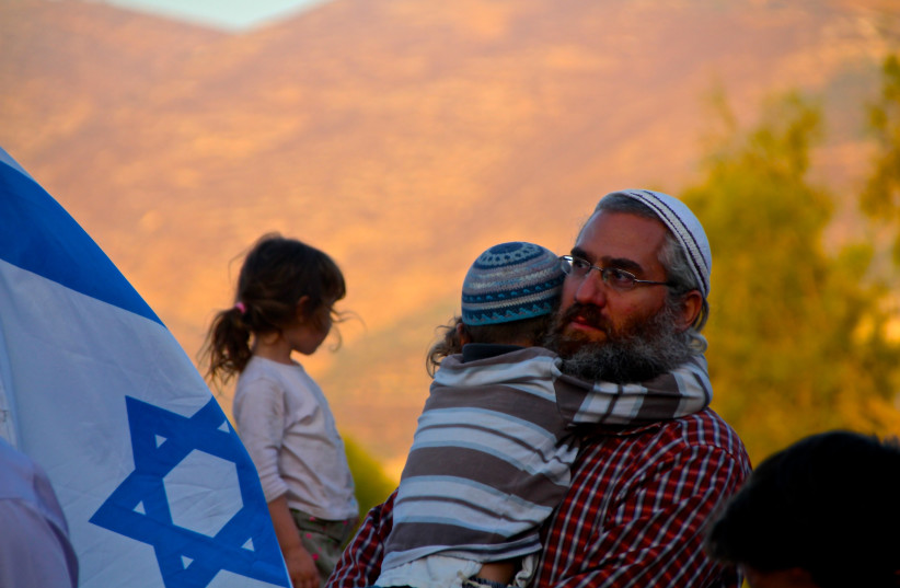 Settlers at a protest rally on the ruins of the Sa-Nur settlement in Samaria (photo credit: TOVAH LAZAROFF)