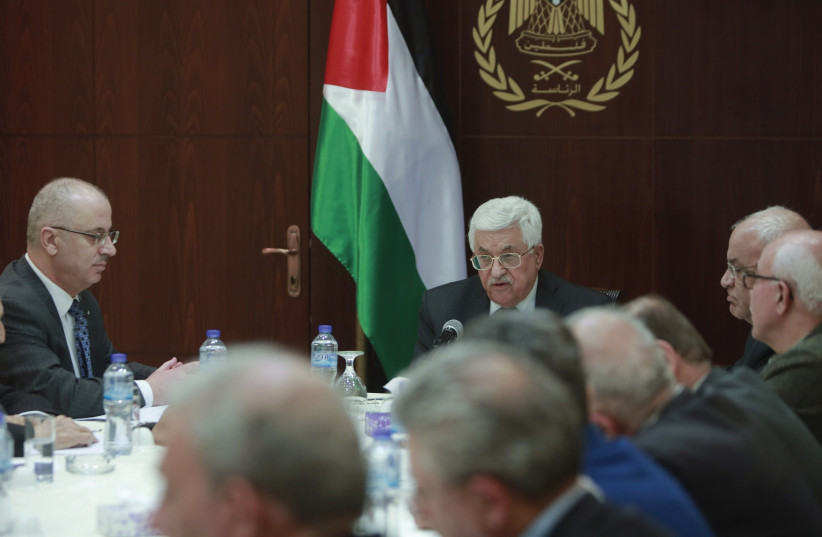 Palestinian president Mahmoud Abbas chairs a PLO meeting (photo credit: FADI AROURI/REUTERS)