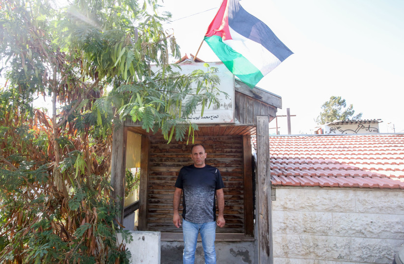Mohammad Shamasneh in front of his home in home in Sheikh Jarrah, August 15, 2017. (photo credit: MARC ISRAEL SELLEM)