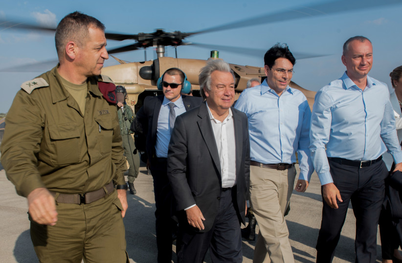 UN Secretary General Antonio Guterres (C) is accompanied by Israel's Ambassador to the UN Danny Danon as he tours the Gaza border (photo credit: IDF SPOKESPERSON'S UNIT)