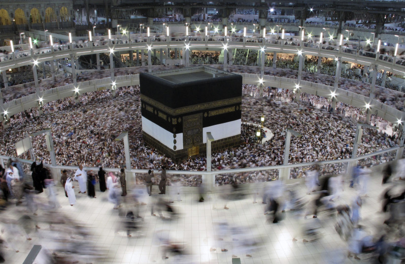 Muslim pilgrims pray around the holy Kaaba at the Grand Mosque, during the annual haj pilgrimage in Mecca September 30 2014. (photo credit: REUTERS)