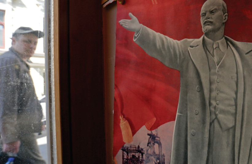 A HISTORIC poster of Vladimir Lenin on display in St. Petersburg (photo credit: REUTERS)