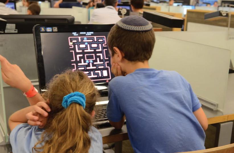 CHILDREN PARTICIPATE in technology-related activities during Scientists’ Night at the University of Haifa in 2016 (photo credit: Courtesy)