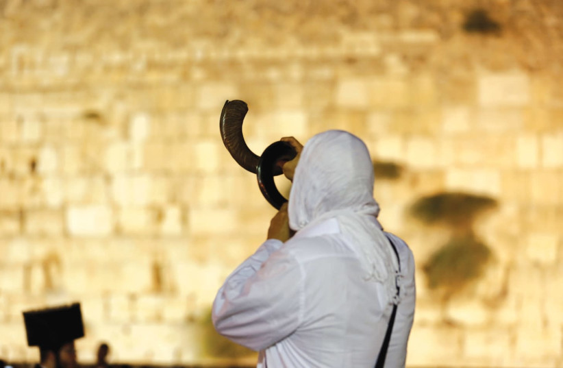 A Jewish man praying at the Western Wall (photo credit: REUTERS)