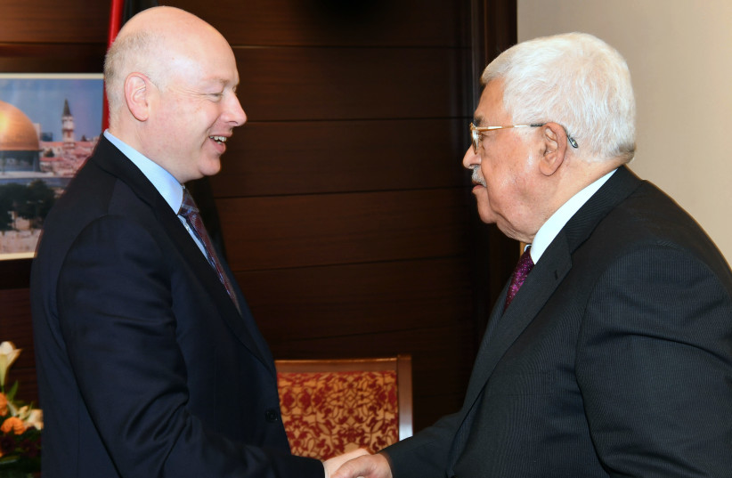 US President's envoy to the Middle East Jason Greenblatt meeting with Palestinian Authority President Mahmoud Abbas (photo credit: AFP PHOTO / PPO / THAER GHANAIM)