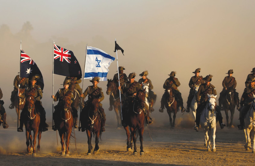 Members of the Australian Light Horse Association take part in a reenactment of the famous World War I cavalry charge known as the ‘Battle of Beersheba’ yesterday as part of the centenary commemorations in the southern city. (photo credit: RONEN ZVULUN / REUTERS)