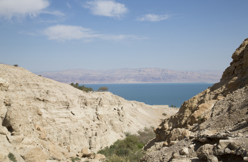 A desert canyon leads in to the Dead Sea  (photo credit: ARIK BAREL)