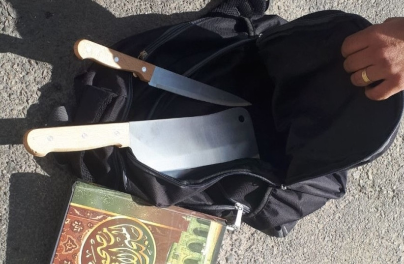 The bag containing the two knives found on the suspected terrorist at the entrance to the West Bank settlement of Kokhav Yaákov on November 9, 2017.  (photo credit: POLICE SPOKESPERSON'S UNIT)