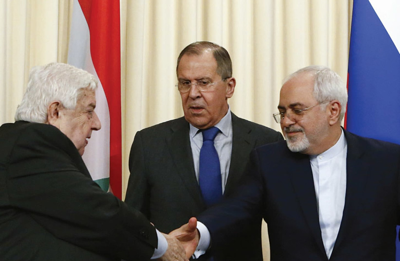 FOREIGN MINISTERS Sergei Lavrov (C) of Russia, Walid al-Muallem (L) of Syria and Mohammad Javad Zarif of Iran attend a news conference in Moscow in April. (photo credit: REUTERS)