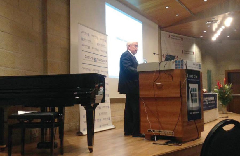 PROF. JAMES HECKMAN of the University of Chicago speaks at the Taub Center conference in Jerusalem yesterday. (photo credit: SARAH LEVI)