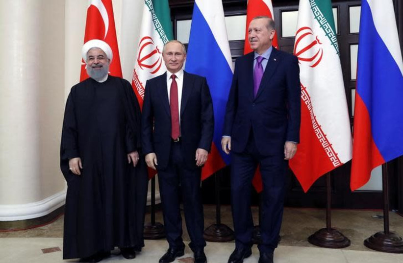 Iran's President Hassan Rouhani, Russia's Vladimir Putin and Turkey's Tayyip Erdogan meet in Sochi, Russia November 22, 2017 (photo credit: SPUTNIK/MIKHAIL METZEL/KREMLIN VIA REUTERS)