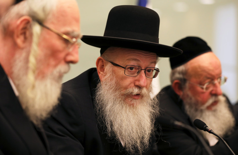 Israel's Deputy Health Minister, Yaakov Litzman (C) from United Torah Judaism party attends a meeting at the Knesset, Israel's parliament, in Jerusalem September 13, 2017. (photo credit: REUTERS)