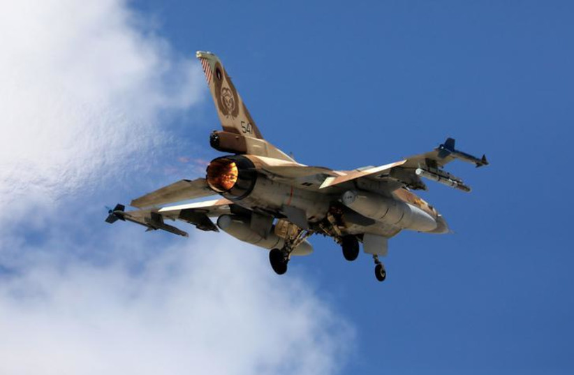 An Israeli F16 fighter jet takes off during a joint international aerial training exercise hosted by Israel and dubbed "Blue Flag 2017" at Ovda military air base in southern Israel November 8, 2017. Picture taken November 8, 2017. (REUTERS/Amir Cohen) (photo credit: REUTERS/AMIR COHEN)